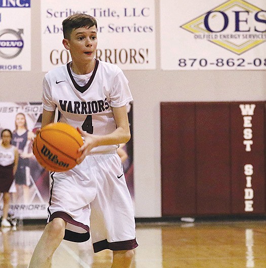 Siandhara Bonnet/News-Times In this file photo, West Side Christian’s Spencer McNabb looks to make a play during a game in the 2019-20 season. Despite graduating 42 points per game of offense last year, the Warriors are off to a 10-1 start this season.