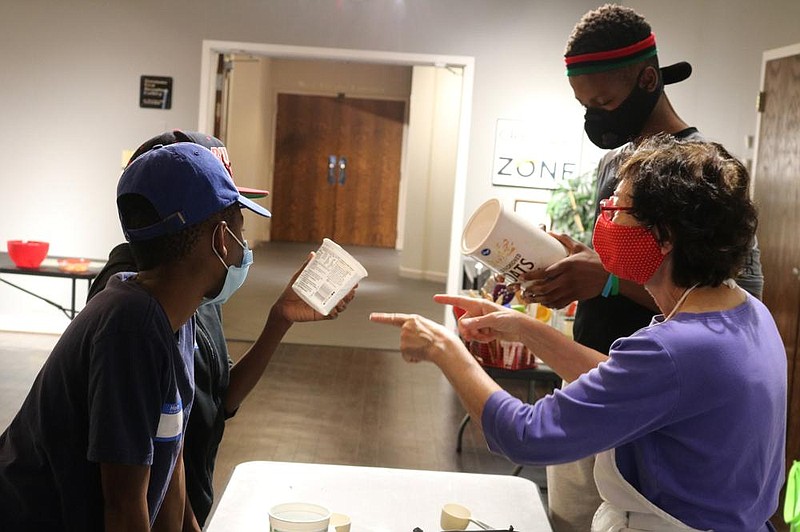 Faith Anaya, right, teaches students how to read nutrition labels during The Arts & Science Center for Southeast Arkansas’s fall 2020 CrEATe Lab. Registration is open for the next CrEATe Lab series, which is set for 1-3 p.m. Saturdays, Jan. 23, Feb. 6 and Feb. 20. (Special to The Commercial) story.lead_photo.caption