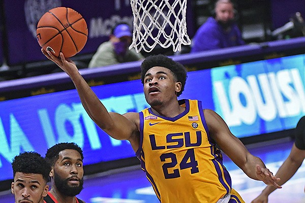 LSU guard Cameron Thomas (24) gets the layup against Georgia during the first half of an NCAA college basketball game Wednesday, Jan. 6, 2021, in Baton Rouge, La. (Hilary Scheinuk/The Advocate via AP)