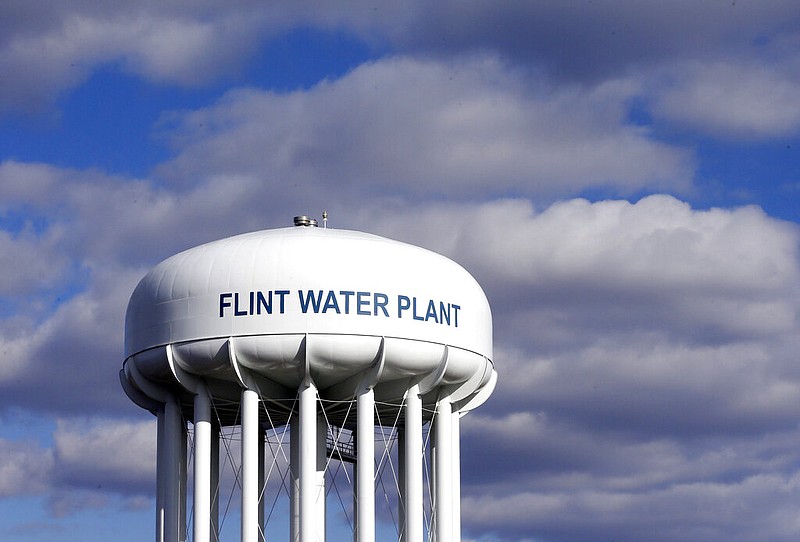 FILE - In this March 21, 2016, file photo, the Flint Water Plant water tower is seen in Flint, Mich. story.lead_photo.caption