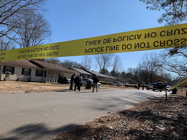 Investigators respond to the scene of a homicide Tuesday, Jan. 12, 2021 at 9701 Stardust Trail in Little Rock.