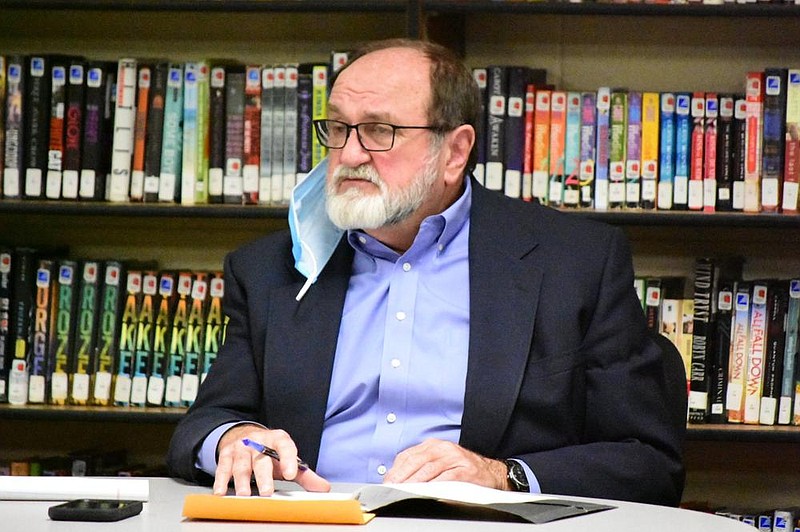 Watson Chapel School District Superintendent Jerry Guess announces his upcoming resignation during Monday's school board meeting in the high school library. (Pine Bluff Commercial/I.C. Murrell)