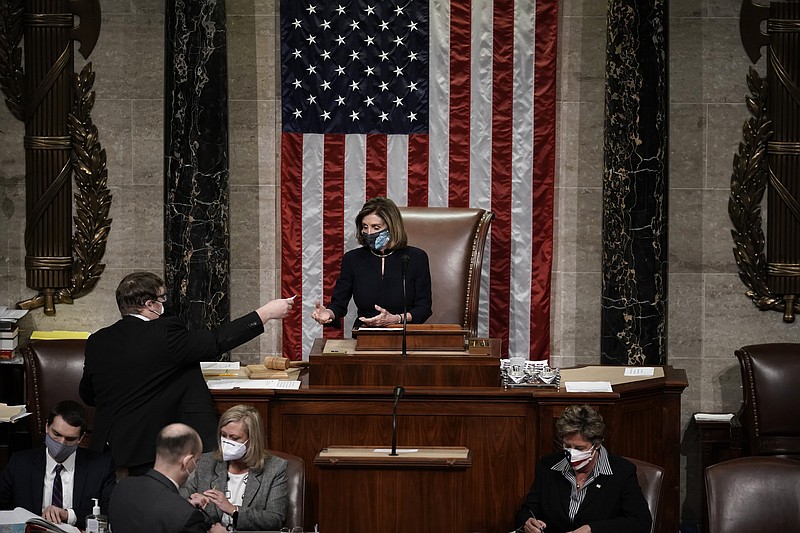 Speaker of the House Nancy Pelosi, D-Calif., leads the final vote of the impeachment of President Donald Trump, for his role in inciting an angry mob to storm the Congress last week, at the Capitol in Washington, Wednesday, Jan. 13, 2021. (AP Photo/J. Scott Applewhite) story.lead_photo.caption