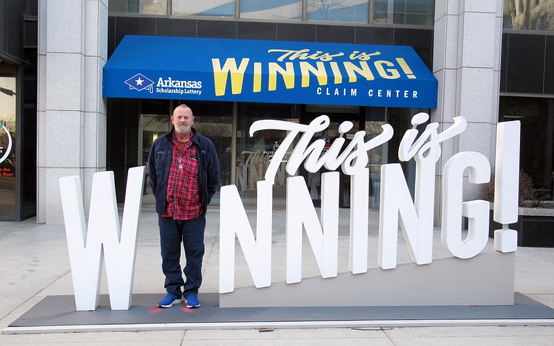 Henry Brixie of Little Rock claimed his winnings Wednesday at the Arkansas Scholarship Lottery Claim Center.