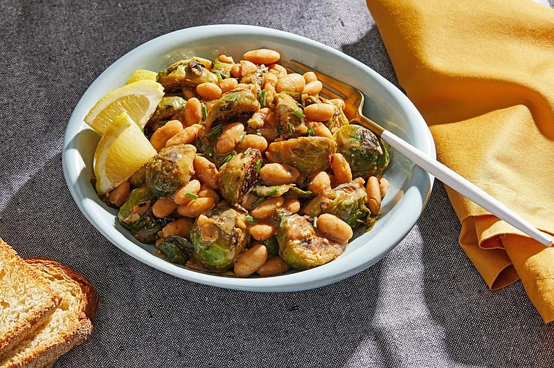 Smoky White Beans and Brussels Sprouts. MUST CREDIT: Photo for The Washington Post by Tom McCorkle story.lead_photo.caption