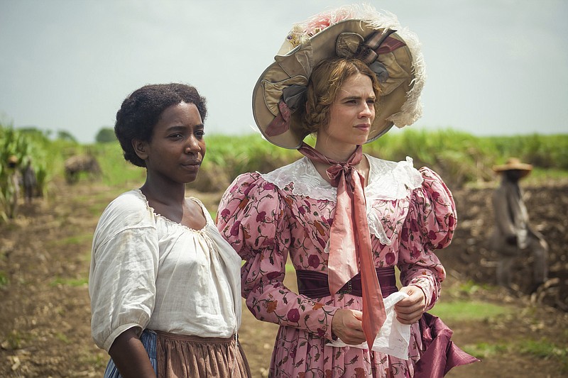 Tamara Lawrance (left) and Hayley Atwell are shown in a scene from the miniseries “The Long Song” debuting Jan. 31 on PBS’ “Masterpiece.” (Heyday Television-PBS via AP/Carlos Rodriguez)