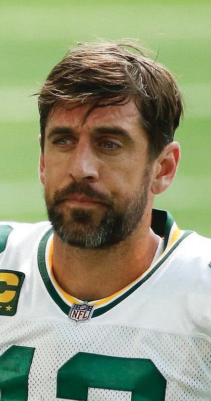 Green Bay Packers quarterback Aaron Rodgers watches from the sideline during the first half of an NFL football game against the Minnesota Vikings, Sunday, Sept. 13, 2020, in Minneapolis. 
(AP Photo/Bruce Kluckhohn)