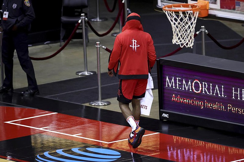 Guard James Harden walks off the court Sunday after Houston’s loss to the Los Angeles Lakers. Harden was traded by the Rockets on Wednesday to the Brooklyn Nets as part of a four-team trade.
(AP/Carmen Mandato)