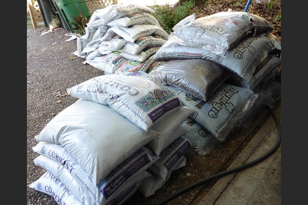 Soil and other amendments come by the bag or truckload; solo gardeners could find bags easier to handle. (Special to the Democrat-Gazette/Janet B. Carson)