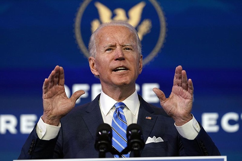 “I know what I just described does not come cheaply, but we simply can’t afford not to do what I’m proposing,” President-elect Joe Biden said Thursday night in Wilmington, Del., in presenting his coronavirus relief plan. More photos at arkansasonline.com/115covid19/.
(AP/Matt Slocum)