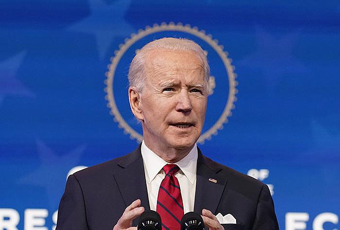 President-elect Joe Biden said Friday that delivering 100 million vaccine shots in his first 100 days in office is only the beginning of his coronavirus plan. More photos at arkansasonline.com/116covid19/.
(AP/Matt Slocum)
