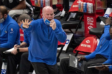 Orlando Magic head coach Steve Clifford shouts instructions to his players during the first half of an NBA game against the Dallas Mavericks.