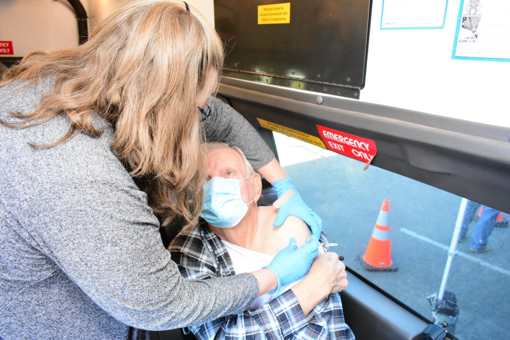 Residents 70 and older receive their first doses of virus vaccine