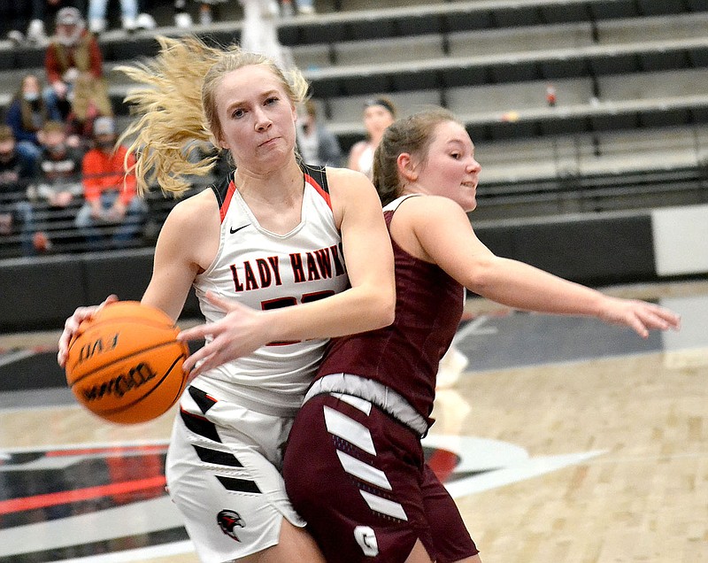 Senior Lady Blackhawk Blakelee Winn, No. 22, reacts to a Gentry Lady Pioneer defender during the Colors Day game Friday, Jan. 15, 2021.