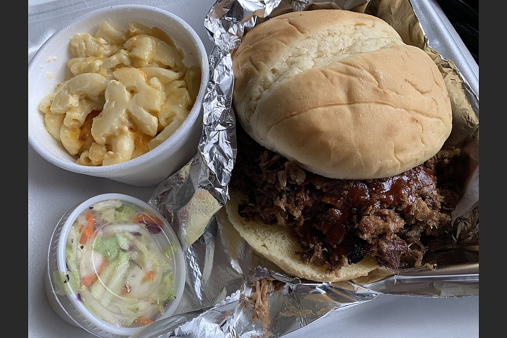 Only the extra sauce was missing from the Beast Brisket Combo from the Smoke Beast BBQ food truck. (Arkansas Democrat-Gazette/Eric E. Harrison)