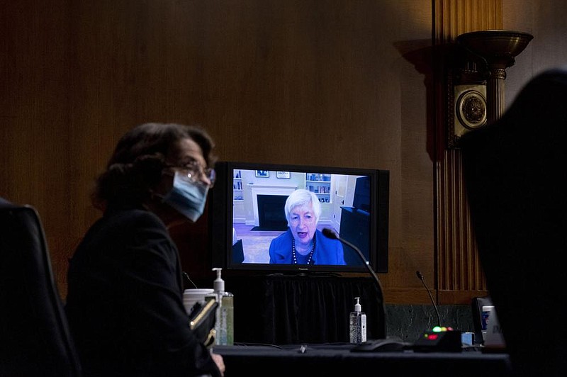 Sen. Dianne Feinstein, D-Calif., left, listens to Janet Yellen give her opening statement via videoconference during a Senate Finance Committee hearing to examine the expected nomination of Janet Yellen to be Secretary of the Treasury on Capitol Hill in Washington, Tuesday, Jan. 19, 2021.
