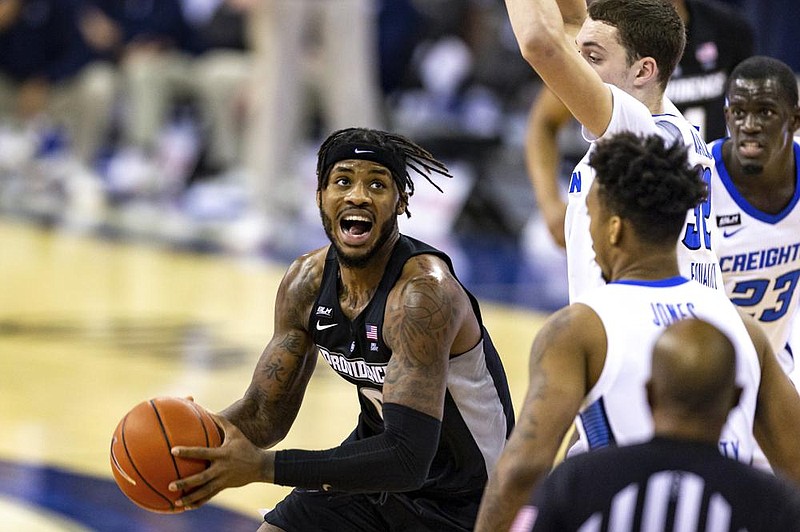 Providence center Nate Watson (0) hit 12 of 19 shots and scored a career-high 29 points to lead the Friars to a 74-70 victory over No. 11 Creighton on Wednesday night. 
(AP/John Peterson)