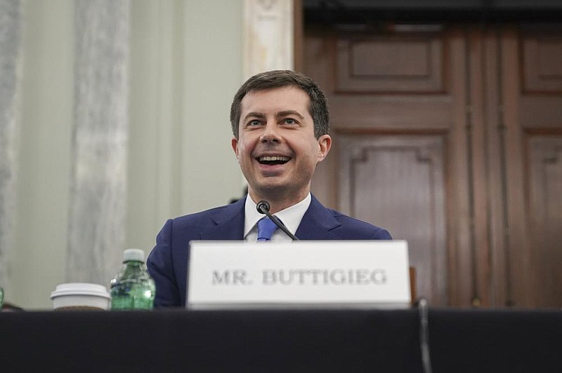 Transportation Secretary nominee Pete Buttigieg smiles during a Senate Commerce, Science and Transportation Committee confirmation hearing on Capitol Hill, Thursday, Jan. 21, 2021, in Washington. (Stefani Reynolds/Pool via AP)