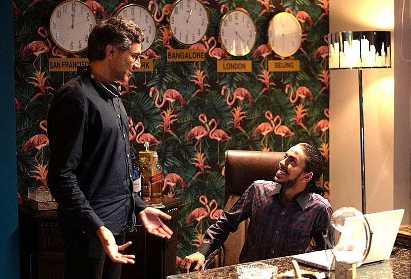 Director Ramin Bahrani consults with actor Adarsh Gourav on the set of Bahrani’s “The White Tiger,” which Bahrani has yet to watch with an audience.