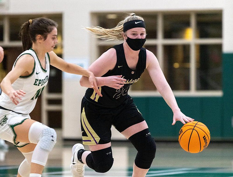 Bethany Dillard (right) of Central Arkansas Christian dribbles past Avery Marsh of Episcopal Collegiate on Friday night in Little Rock. Article, Page 7C. More photos available at arkansasonline.com/123nlrlr.
(Arkansas Democrat-Gazette/Justin Cunningham)