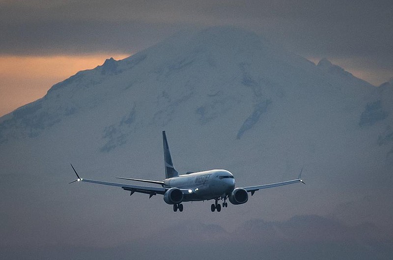 Mount Baker in Washington state is a backdrop as a WestJet Airlines Boeing 737 Max aircraft arrives earlier this week at Vancouver International Airport in Richmond, British Columbia. Ethiopian Airlines has sued Boeing over the 2019 crash of a 737 Max.
(AP/The Canadian Press/Darryl Dyck)