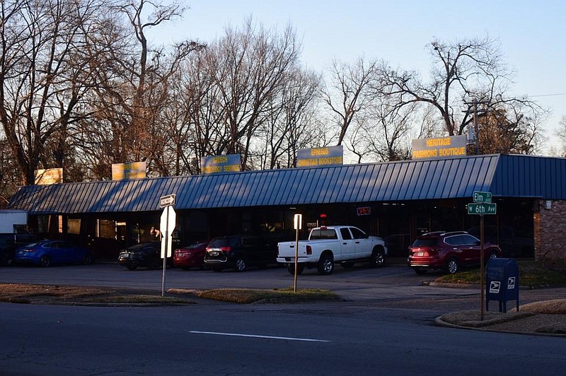 Small businesses can now apply for a second round of Paycheck Protection Program loans, providing they meet the requirements. Shown here is a mini-shopping center at Elm Street and West Sixth Avenue in Pine Bluff. 
(Pine Bluff Commercial/I.C. Murrell)