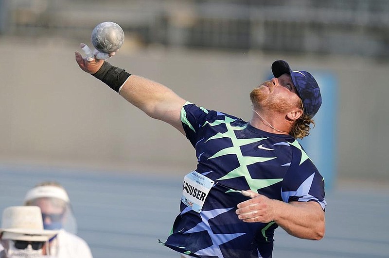 Ryan Crouser throws during the Blue Oval Showcase shot put, Tuesday, Aug. 25, 2020, at Drake Stadium in Des Moines, Iowa. (AP Photo/Charlie Neibergall)
