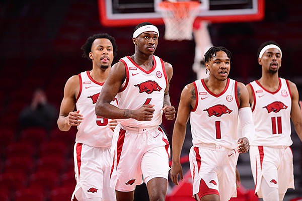 Arkansas players (from left) Moses Moody, Davontae Davis, JD Notae and Jalen Tate are shown during a game against Ole Miss on Wednesday, Jan. 27, 2021, in Fayetteville. 