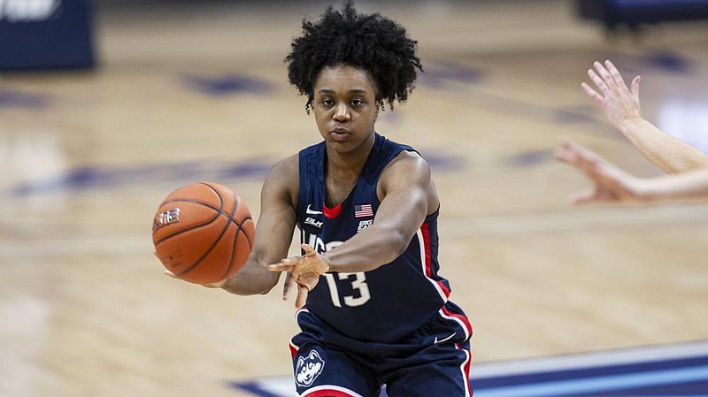 UConn guard Christyn Williams (13) in action during an NCAA college basketball game against Villanova, Tuesday, Dec. 22, 2020, in Villanova, Pa. (AP Photo/Laurence Kesterson)