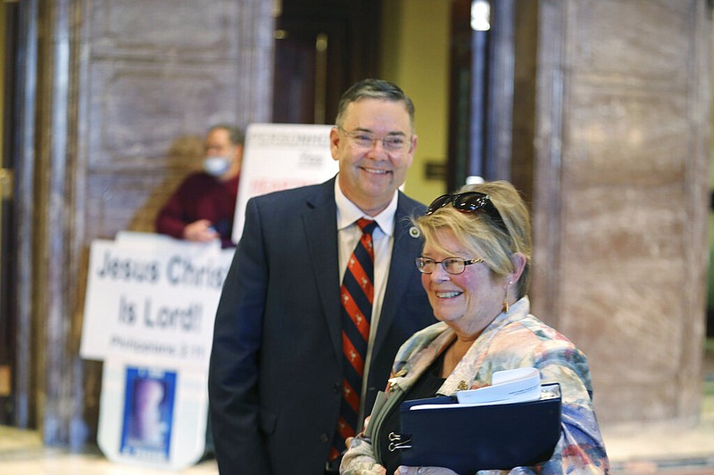 South Carolina state Rep. John McCravy (left), R-Greenwood, and South Carolina Citizens for Life Executive Director Holly Gatling talk Thursday, Jan. 28, 2021, in Columbia, S.C., after the state Senate approved a bill that would likely ban almost all abortions in the state. McCravy has worked to pass similar bills in the South Carolina House.