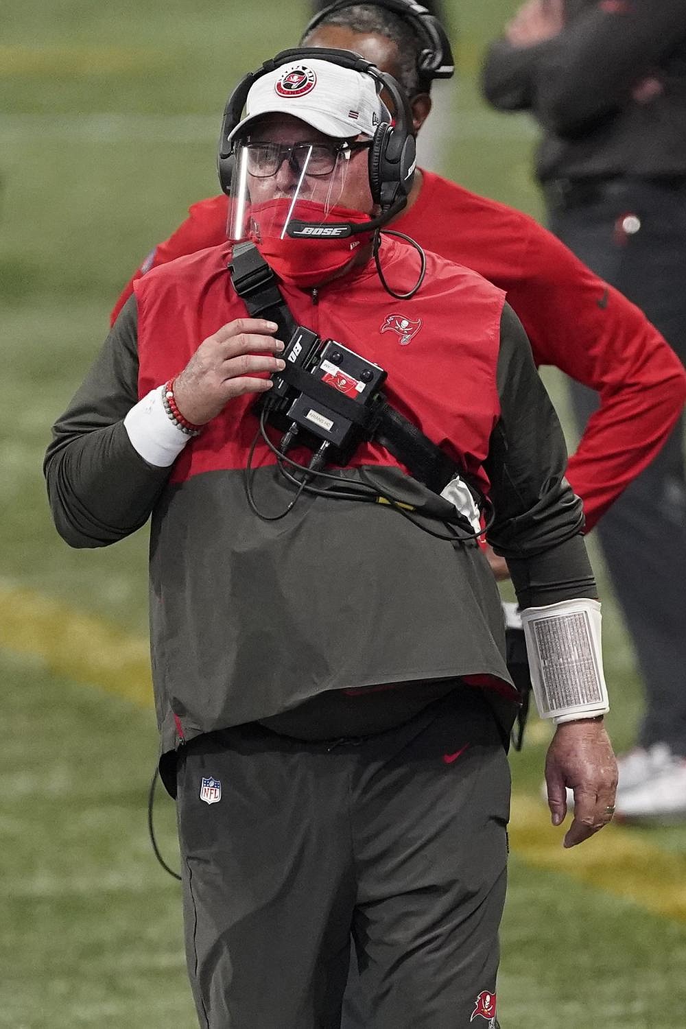 Tampa Bay Buccaneers head coach Bruce Arians walks the sidelines against the Atlanta Falcons during the first half of an NFL football game, Sunday, Dec. 20, 2020, in Atlanta.
(AP Photo/John Bazemore)