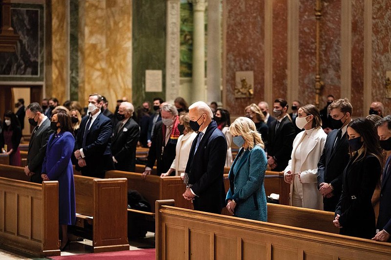 President-elect Joe Biden and his wife Dr. Jill Biden attend Mass at the Cathedral of St. Matthew the Apostle, along with Vice President-elect Kamala Harris and her husband, Doug Emhoff, during Inauguration Day ceremonies in Washington on Jan. 20.
(The New York Times/Doug Mills)