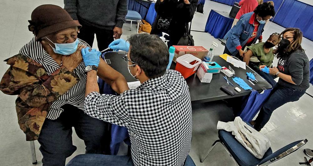 102-year-old mother leads way as she, family get covid-19 shots