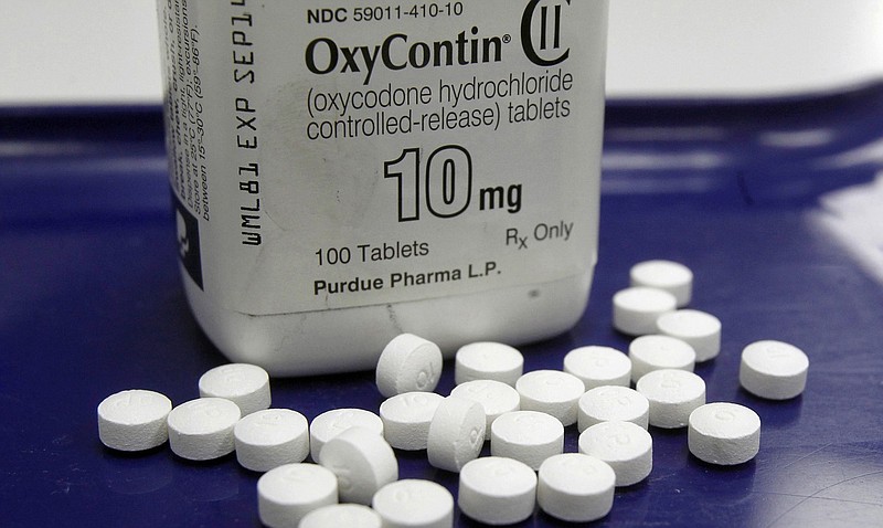 OxyContin pills are arranged at a pharmacy in Montpelier, Vt., in this Feb. 19, 2013, file photo. (Associated Press)
