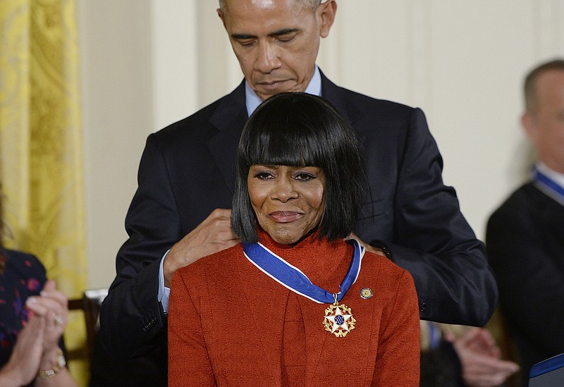 U.S. President Barack Obama presents Cicely Tyson with the Presidential Medal of Freedom in 2016 in the East Room of the White House in Washington. Tyson died Jan. 28. According to her recently released memoir, she was 87. Public records indicate she was 96. (Olivier Douliery/Abaca Press/TNS)