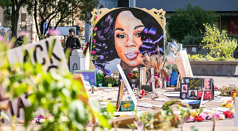 This memorial in Louisville, Ky., — shown Oct. 2 — was for Breonna Taylor, who was killed by police serving a warrant at her apartment in March. (Democrat-Gazette file photo)