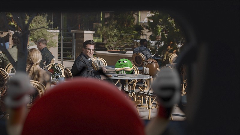 This photo provided by M&M's shows a scene from M&M's 2021 Super Bowl NFL football spot featuring Dan Levy. (M&M's via AP) story.lead_photo.caption