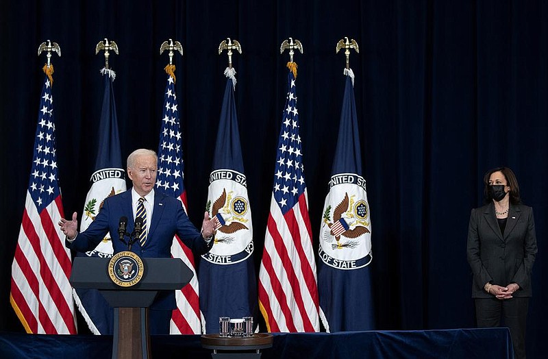 “We will not hesitate to raise the cost on Russia and defend our vital interests and our people,” President Joe Biden said Thursday at the State Department in a broad reset of American foreign policy. Joining Biden was Vice President Kamala Harris (right). More photos at arkansasonline.com/25biden/.
(The New York Times/Stefani Reynolds)