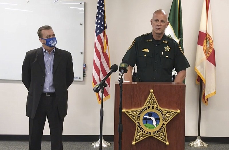In this screen shot from a YouTube video posted by the Pinellas County Sheriff's Office, Pinellas County Sheriff Bob Gualtieri speaks during a news conference as Oldsmar, Fla., Mayor Eric Seidel, left, listens, Monday, Feb. 8, 2021, in Oldsmar, Fla. Authorities say a hacker gained access to Oldsmar's water treatment plant in an unsuccessful attempt to taint the water supply with a caustic chemical. (Pinellas County Sheriff's Office via AP) story.lead_photo.caption