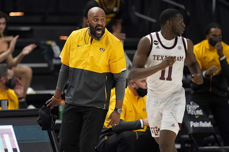 Missouri head coach Cuonzo Martin reacts as his team comes down court against Texas A&M during the second half of an NCAA college basketball game Saturday, Jan. 16, 2021, in College Station, Texas. (AP Photo/Sam Craft)