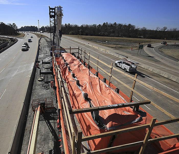 Traffic moves through a construction zone Wednesday Feb. 3, 2021 in Little Rock at Cantrell Road and Interstate 430. (Arkansas Democrat-Gazette/Staton Breidenthal)

