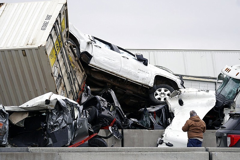 Vehicles are piled up after a fatal crash on Interstate 35 near Fort Worth, Texas on Thursday, Feb. 11, 2021.