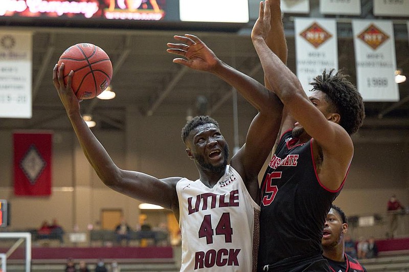 UALR’s Ruot Monyyong (44) puts up a shot while Arkansas State’s Norchad Omier defends during Saturday’s game at the Jack Stephens Center in Little Rock.
(Photo courtesy of UALR Athletics)