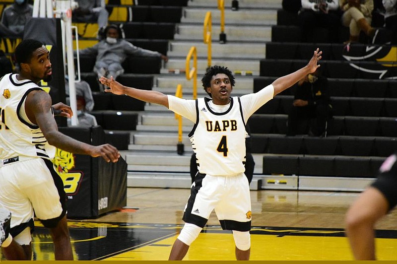 Joshuwan Johnson (4) and Shaun Doss (21) lead the UAPB Golden Lions back home for home games against Southern University today and Alcorn State on Monday. 
(Pine Bluff Commercial/I.C. Murrell)