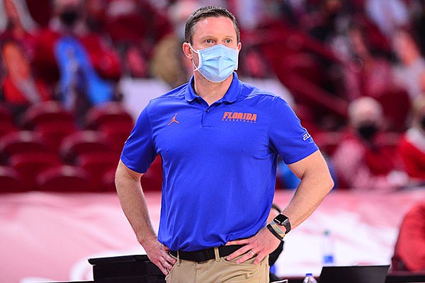 Florida coach Mike White is shown during a game against Arkansas on Tuesday, Feb. 16, 2021, in Fayetteville. 