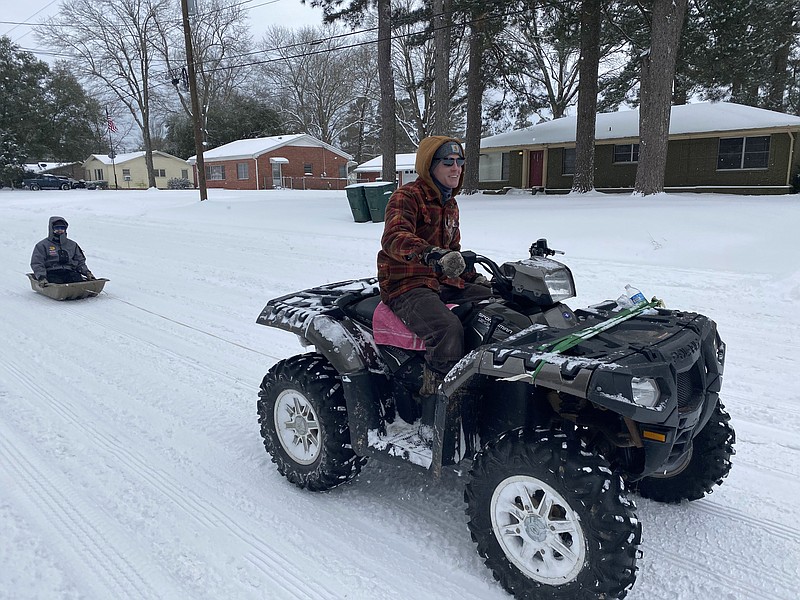 Magnolia residents revel in the snow Magnolia Banner News