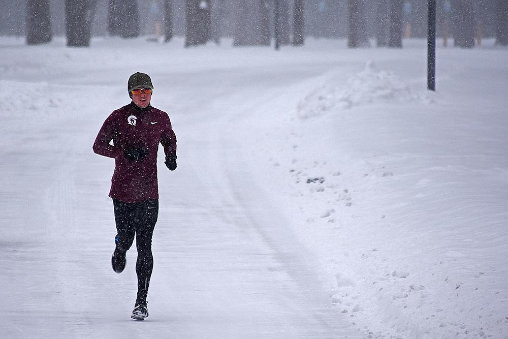 Andrew Payton, a member of the University of Arkansas at Little Rock cross country team, goes for a run around the UALR campus Wednesday.
(Arkansas Democrat-Gazette/Staci Vandagriff)