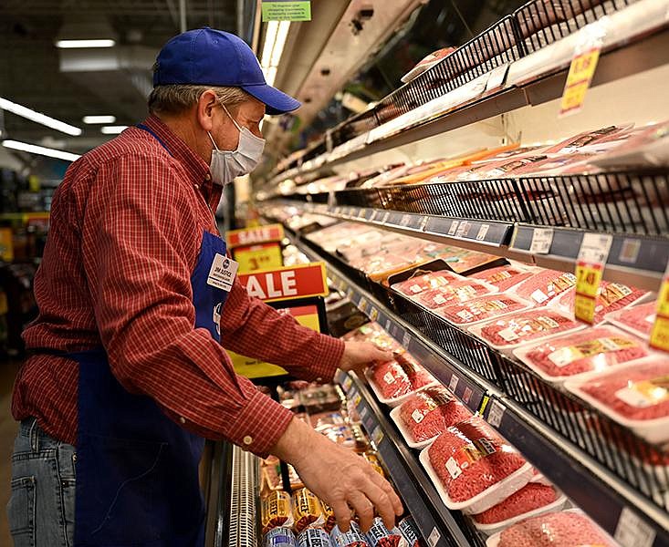 Jim Justice, Meat Department Lead at the Kroger on Beechwood in Little Rock, makes sure the meat is fully stocked on the shelves during his shift on Tuesday, Feb. 16, 2021. See more photos at arkansasonline.com/217snow/

(Arkansas Democrat-Gazette/Stephen Swofford)