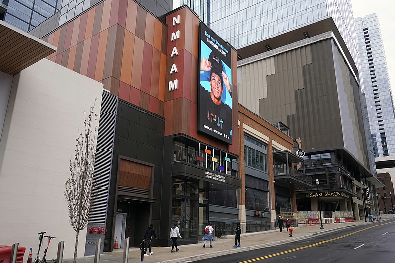 Visitors approach the entrance of the National Museum of African American Music on Jan. 30 in Nashville, Tenn. This new museum is the first to span multiple genres including gospel, blues, jazz, R&B and hip hop. (AP Photo/Mark Humphrey)