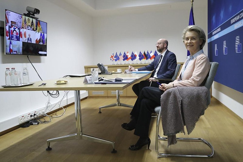 European Commission President Ursula von der Leyen (right) and European Council President Charles Michel, in Brussels, take part in Friday’s virtual G-7 meeting.
(AP/Olivier Hoslet)